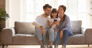 Family Using a Cell Phone